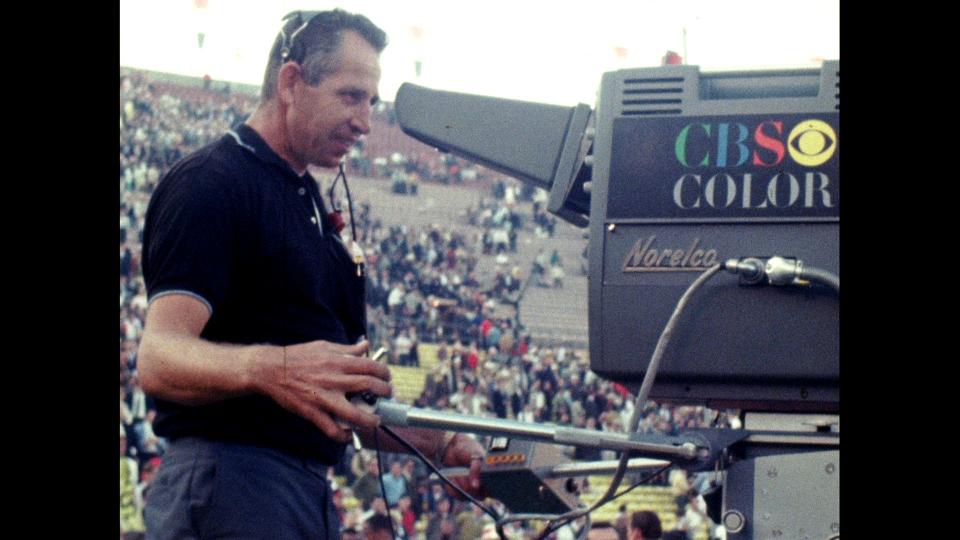 A CBS cameraman shoots Super Bowl I on Jan. 15, 1967 at Los Angeles California's Memorial Coliseum. The game aired on CBS and NBC because the two leagues, the National Football League and American Football League, both had TV contracts.
