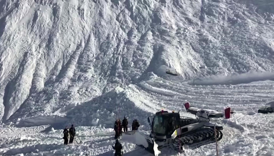 In this image taken from video, rescue personnel work at the site of an avalanche at Lavachet Wall in Tignes, France, Monday Feb. 13, 2017. French rescue workers say a number of skiers have been killed in an avalanche in the French Alps near the resort of Tignes. It occurred in an area popular among international skiers for its extensive slopes and stunning views, but no information was immediately available about the skiers' nationalities. (AP Photo)