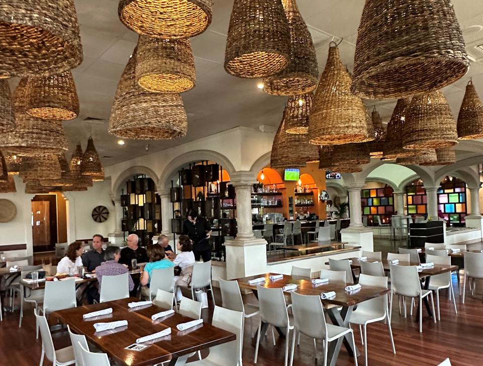 The dining room in the Polvos at Baton Creek Mall features a full bar and high ceilings.