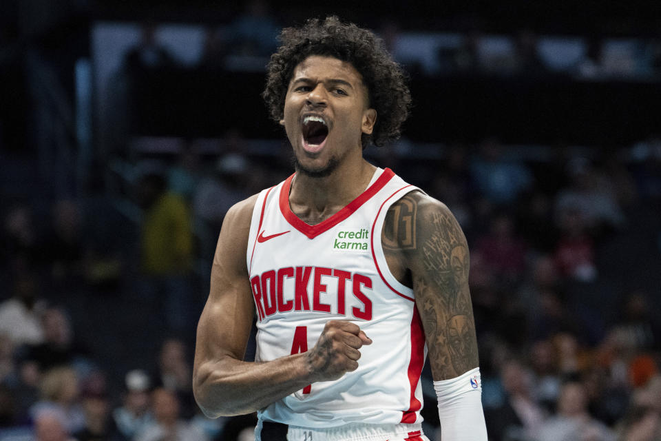 Houston Rockets guard Jalen Green reacts during the first half of the team's NBA basketball game against the Charlotte Hornets on Friday, Jan. 26, 2024 in Charlotte, N.C. (AP Photo/Jacob Kupferman)