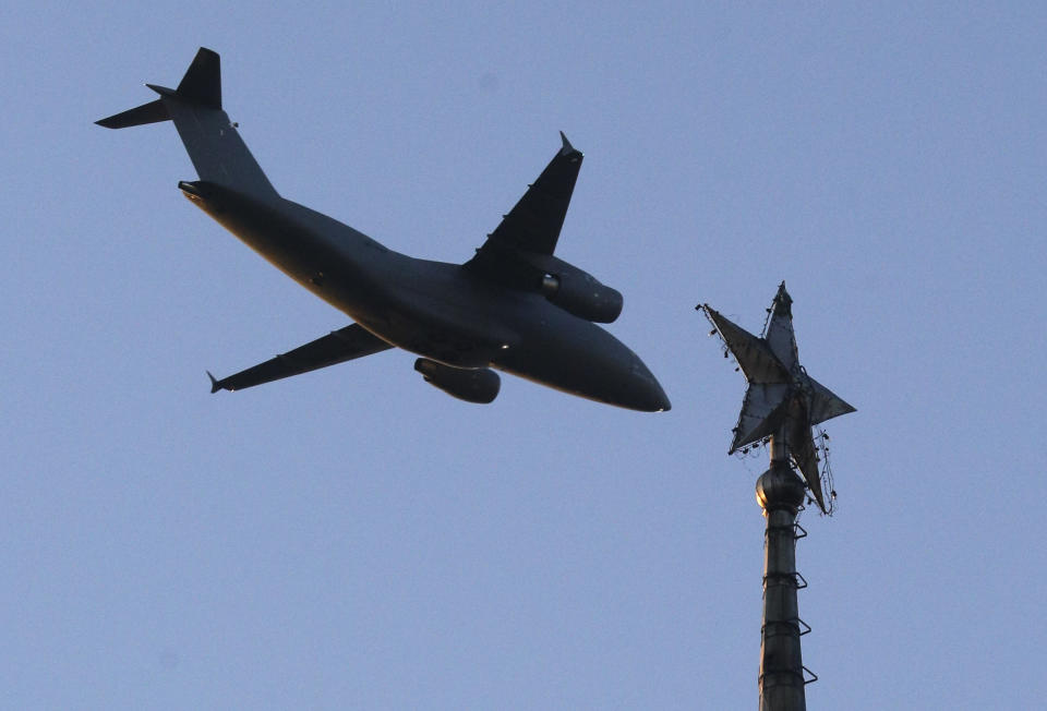 Military aircraft practices above the city centre during a rehearsal for the Independence Day military parade in Kiev, Ukraine, Wednesday, Aug. 22, 2018. Ukraine will mark the 27th anniversary of the Independence Day on Aug. 24. (AP Photo/Efrem Lukatsky)