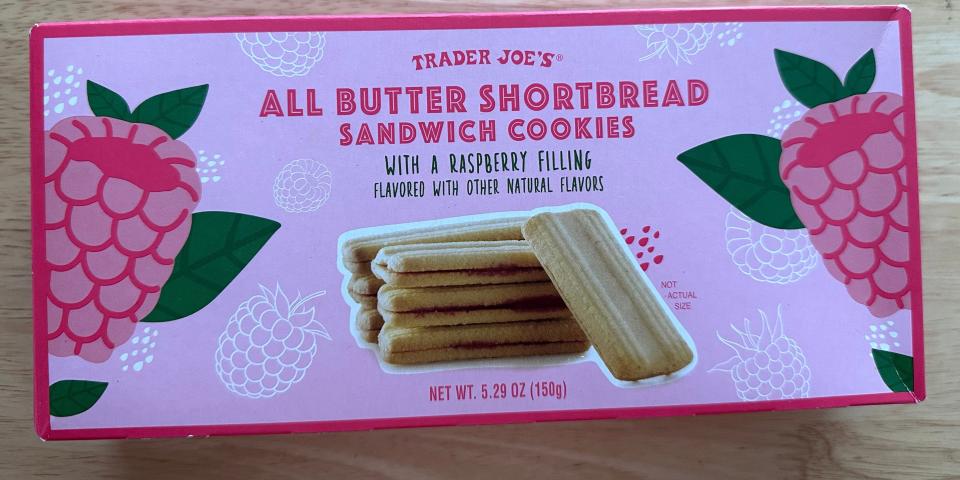 Trader Joe's all-butter shortbread sandwich cookies with raspberry filling on table