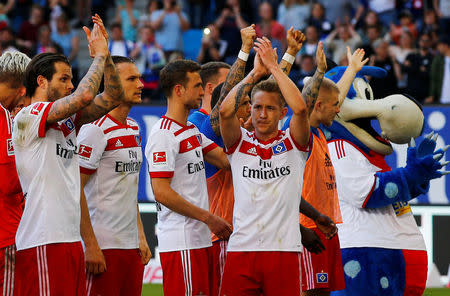 Soccer Football - Bundesliga - Hamburger SV vs SC Freiburg - Volksparkstadion, Hamburg, Germany - April 21, 2018 Hamburg's Lewis Holtby celebrates after the match REUTERS/Morris Mac Matzen