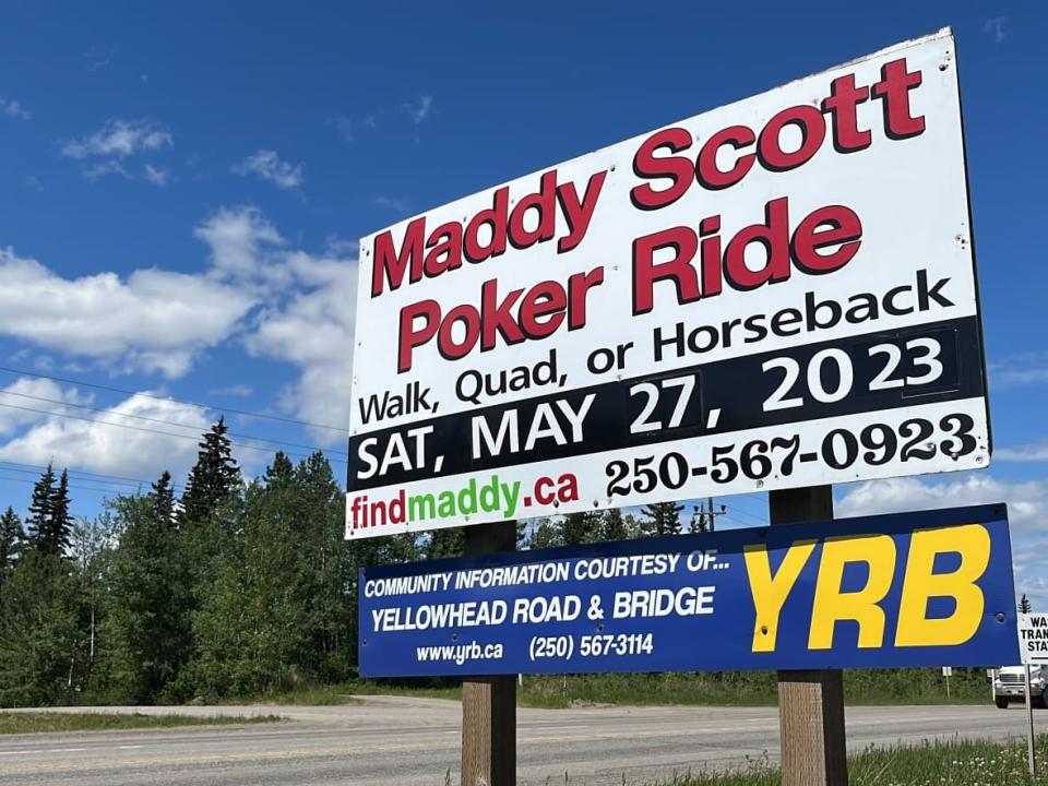 A billboard advertises the annual search for Madison Scott in Vanderhoof, B.C. Days after this year's event was held, RCMP announced the discovery of Scott's remains. (Andrew Kurjata/CBC - image credit)
