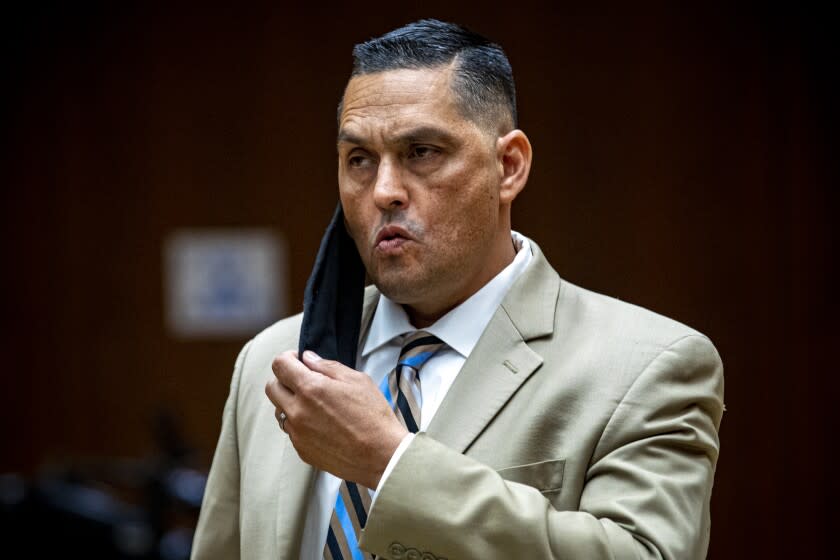 LOS ANGELES, CA - JUNE 11: LAPD Officer Frank Hernandez at arraignment pleaded not guilty to assault charges Thursday after a video showed him repeatedly punching an unarmed homeless man during in Boyle Heights earlier this year. He is due back in court in July. Clara Shortridge Foltz Criminal Justice Center on Thursday, June 11, 2020 in Los Angeles, CA. (Irfan Khan / Los Angeles Times)