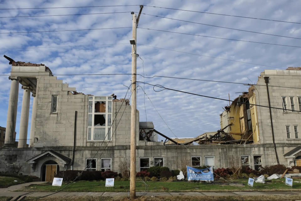 Tornado damage to the Mayfield First United Methodist Church's century-old building is seen on Jan. 9, 2022, in Mayfield, Ky. (AP Photo/Audrey Jackson)