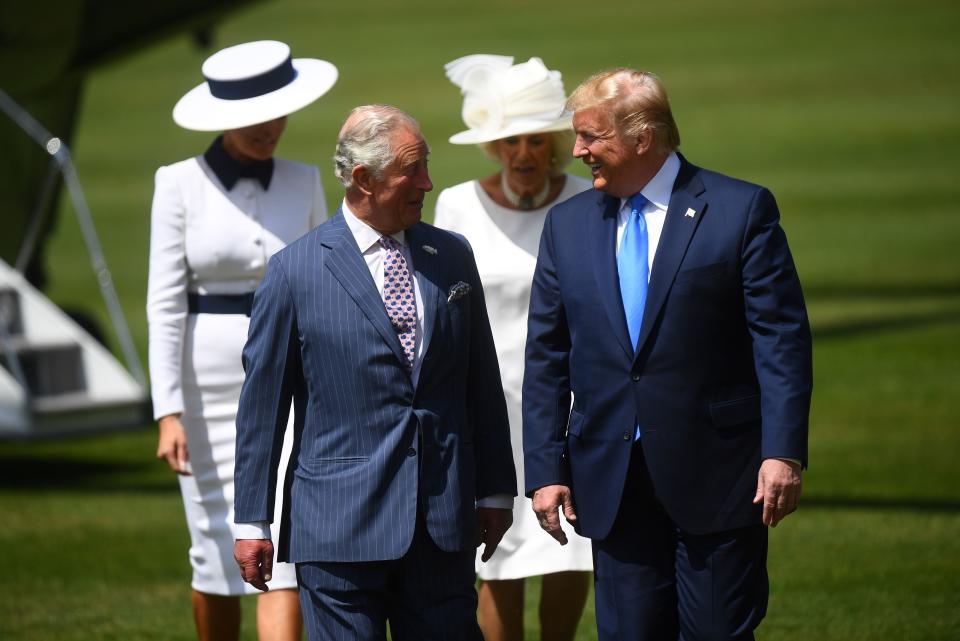 US President Donald Trump (R) walks with Britain's Prince Charles, Prince of Wales (3R), and US First Lady Melania Trump (L) walks with Britain's Camilla, Duchess of Cornwall as they arrive for a welcome ceremony at Buckingham Palace in central London on June 3, 2019, on the first day of the US president and First Lady's three-day State Visit to the UK. - Britain rolled out the red carpet for US President Donald Trump on June 3 as he arrived in Britain for a state visit already overshadowed by his outspoken remarks on Brexit. (Photo by Victoria Jones / POOL / AFP)        (Photo credit should read VICTORIA JONES/AFP/Getty Images)