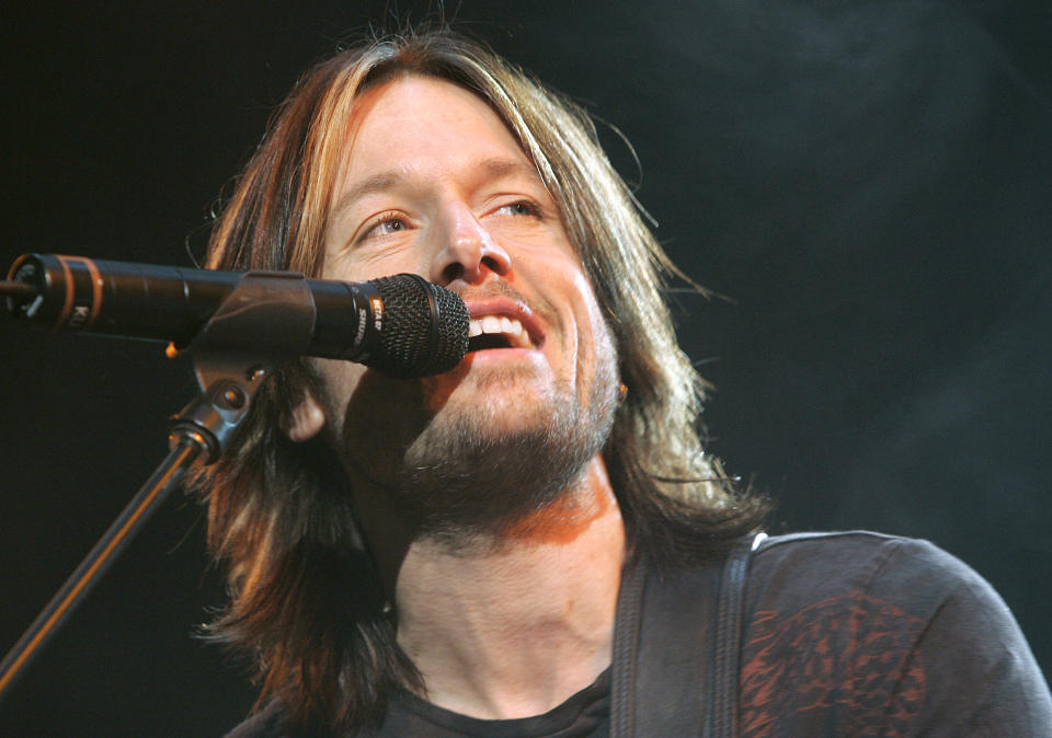 Keith Urban performs at the Kemper Arena in Kansas City, Mo., Thursday, Dec. 1, 2005. (AP Photo/The Kansas City Star, Jill Toyoshiba) ** NO MAGS, NO SALES, NO INTERNET *