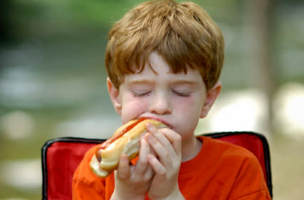 <div class="caption-credit"> Photo by: iStockphoto</div><b>Hot Dogs - 2.6% of food choking ER visits <br></b> Hot dogs are the same shape as a child's airway and a usual suspect to be blamed for choking. Even if you cut it in a coin, it's still the same shape as your child's throat. We halve, and then quarter lengthwise our veggie dogs when we pack them in our son's lunch. <br> <b><a rel="nofollow noopener" href="http://www.babble.com/kid/10-tips-for-moms-things-dads-just-wish-youd-know-how-to-do/?cmp=ELP|bbl||YahooShine||InHouse|081213|ChokingHazards||famE|" target="_blank" data-ylk="slk:Related: 10 things dads wish moms would learn how to do;elm:context_link;itc:0;sec:content-canvas" class="link "><i>Related: 10 things dads wish moms would learn how to do</i></a></b>
