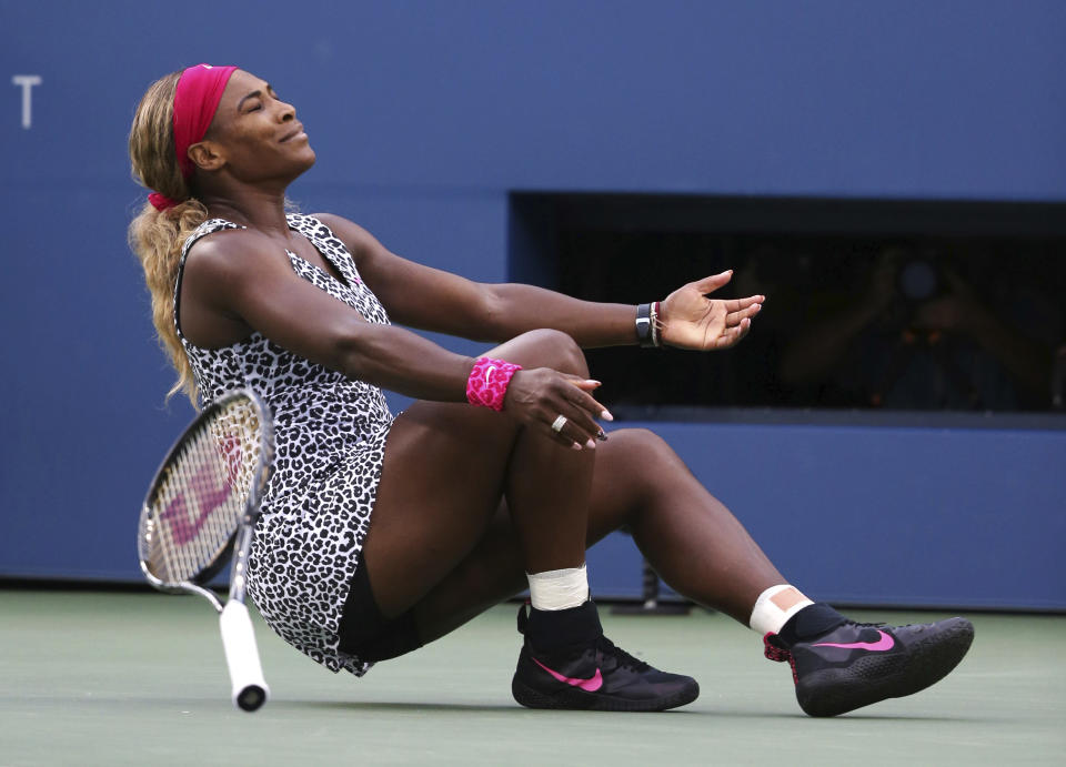 FILE - Serena Williams reacts after defeating Caroline Wozniacki, of Denmark, during the championship match of the 2014 U.S. Open tennis tournament, Sunday, Sept. 7, 2014, in New York. Saying “the countdown has begun,” 23-time Grand Slam champion Serena Williams announced Tuesday, Aug. 9, 2022, she is ready to step away from tennis so she can turn her focus to having another child and her business interests, presaging the end of a career that transcended sports. (AP Photo/Mike Groll, FIle)