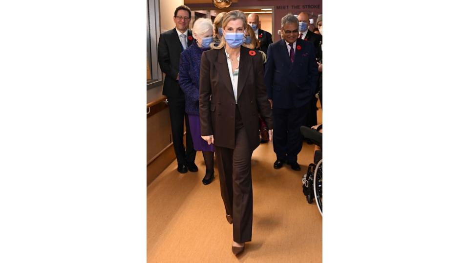 Duchess of Edinburgh wearing chocolate brown suit and face mask in Torontoat 