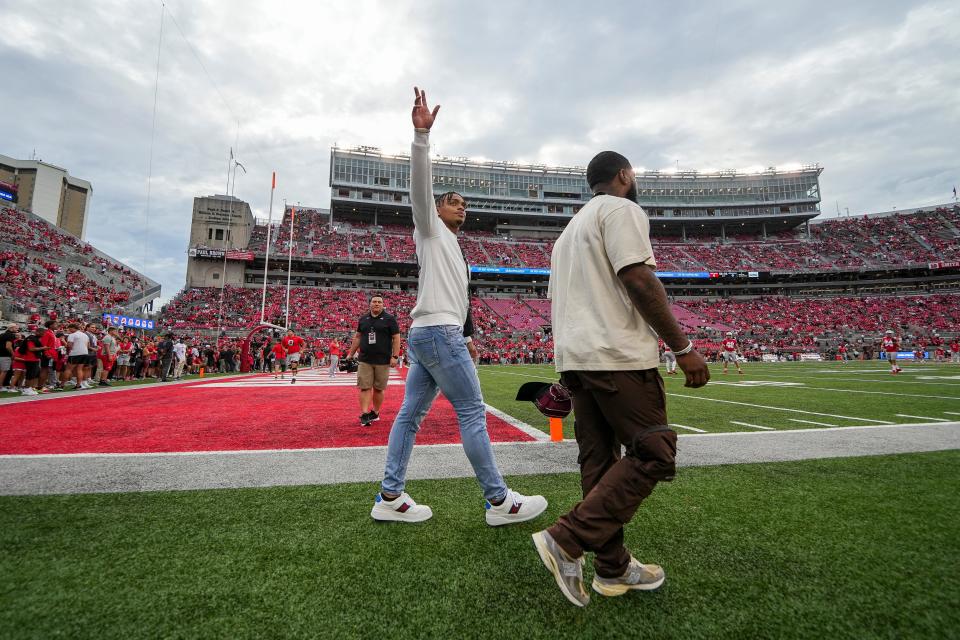 Sep 3, 2022; Columbus, Ohio, USA;  Chicago Bears quarterback Justin Fields walks across the field prior to the NCAA football game between the Ohio State Buckeyes and Notre Dame Fighting Irish at Ohio Stadium. Mandatory Credit: Adam Cairns-USA TODAY Sports