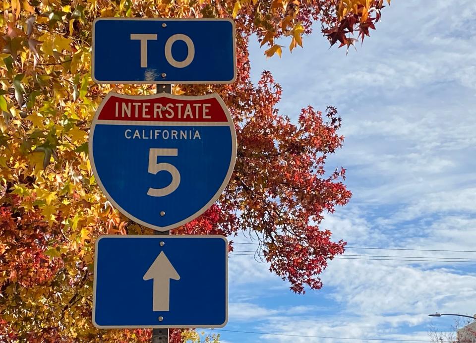 A sign points the way to Interstate 5 in Redding.