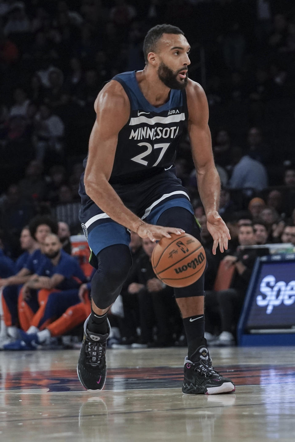 Minnesota Timberwolves' Rudy Gobert dribbles up court during a preseason NBA basketball game against the New York Knicks, Saturday, Oct. 14, 2023, in New York. (AP Photo/Bebeto Matthews)