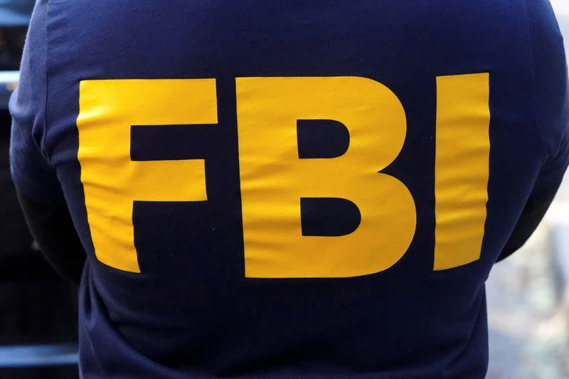 FILE PHOTO: An FBI logo is pictured on an agent's shirt in the Manhattan borough of New York City