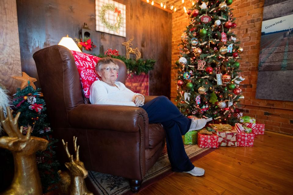Jan Williams sits in a chair in the Plains Historic Inn & Antique Mall as she shares memories of former first lady Rosalynn Carter on Monday, Nov. 27, 2023.