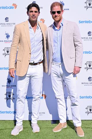 <p>Jason Koerner/Getty</p> Nacho Figueras (left) and Prince Harry attend the Royal Salute Polo Challenge in Florida on April 12, 2024