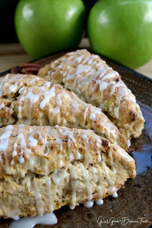 <p>Great Grub Delicious Treats</p><p>These apple pecan scones are perfect to make during the fall season. </p><p><strong>Get the recipe: <em><a href="https://www.greatgrubdelicioustreats.com/apple-pecan-scones/" rel="nofollow noopener" target="_blank" data-ylk="slk:Apple Pecan Scones;elm:context_link;itc:0;sec:content-canvas" class="link ">Apple Pecan Scones</a></em></strong></p>