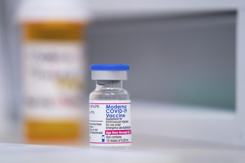 A vial of the Moderna COVID-19 vaccination for children under five sits on a counter at Walgreens pharmacy Monday, June 20, 2022, in Lexington, S.C. Today marked the first day COVID-19 vaccinations were made available to children under 5 in the United States. (AP Photo/Sean Rayford)