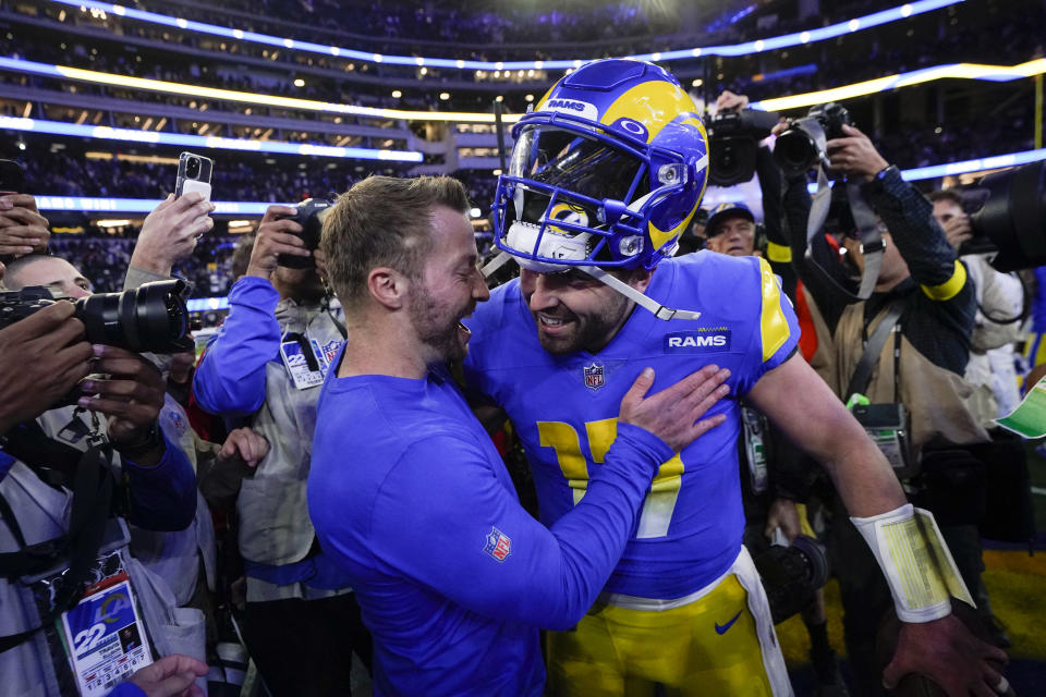 Los Angeles Rams head coach Sean McVay, left, embraces quarterback Baker Mayfield after the Rams defeated the Las Vegas Raiders 17-16 in an NFL football game Thursday, Dec. 8, 2022, in Inglewood, Calif. (AP Photo/Mark J. Terrill)