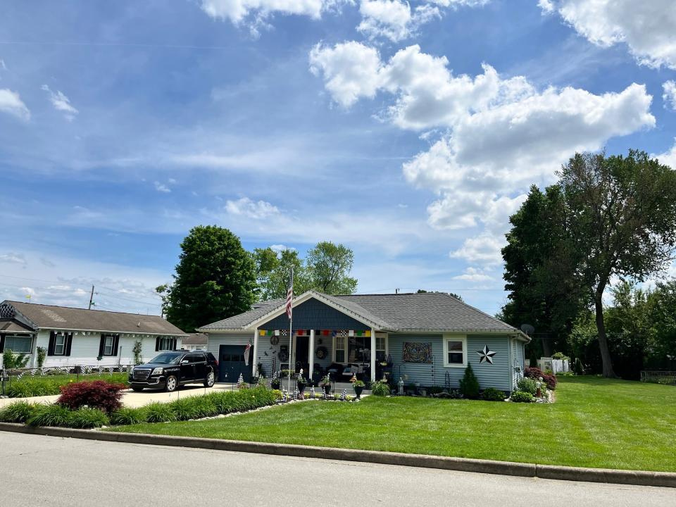 Sandy Rosner's property on West 24th Street in Speedway pictured on May 20, 2024. Rosner lives just a short walk from the Indianapolis Motor Speedway and has lived in her home and parked cars on her property during the Indy 500 weekend since 1993.