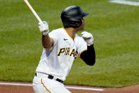 Pittsburgh Pirates' Cal Mitchell watches his RBI single off Colorado Rockies starting pitcher Kyle Freeland during the fifth inning of a baseball game in Pittsburgh, Tuesday, May 24, 2022. (AP Photo/Gene J. Puskar)