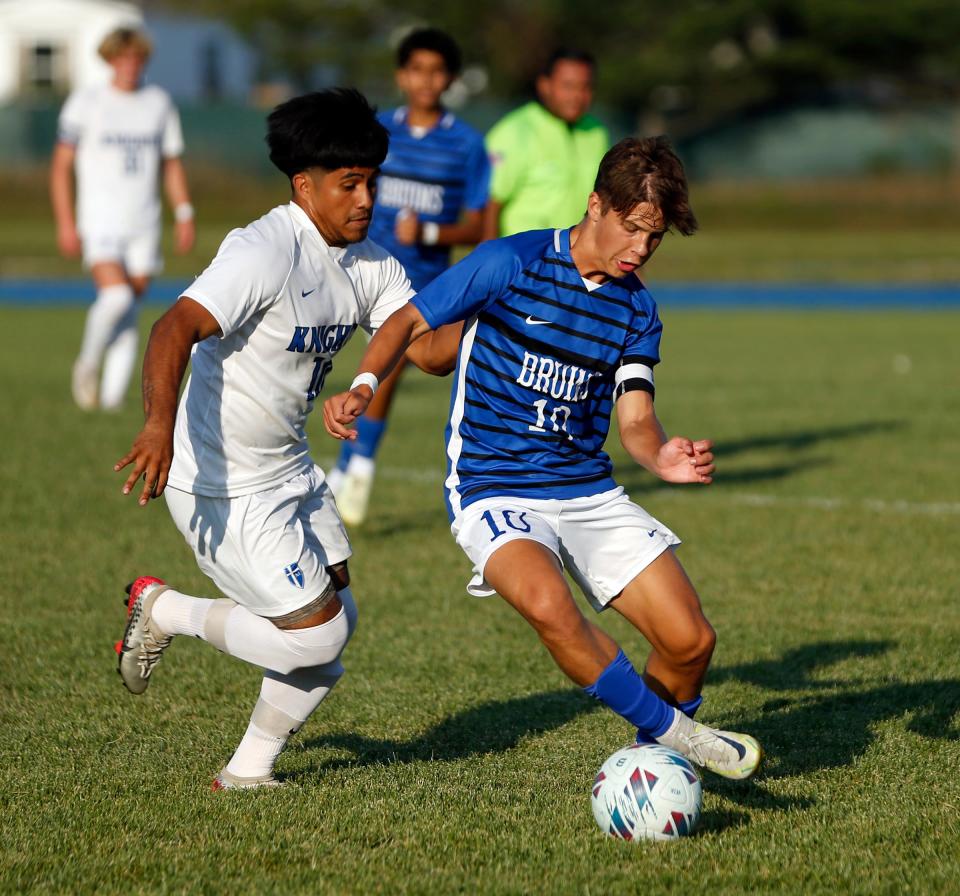Bethany Christian sophomore Sawyer Beachy, right, and Mishawaka Marian senior Jose Hernandez battle for possession of the ball during a game on Monday, Aug. 28, 2023, at Bethany Christian High School in Goshen.