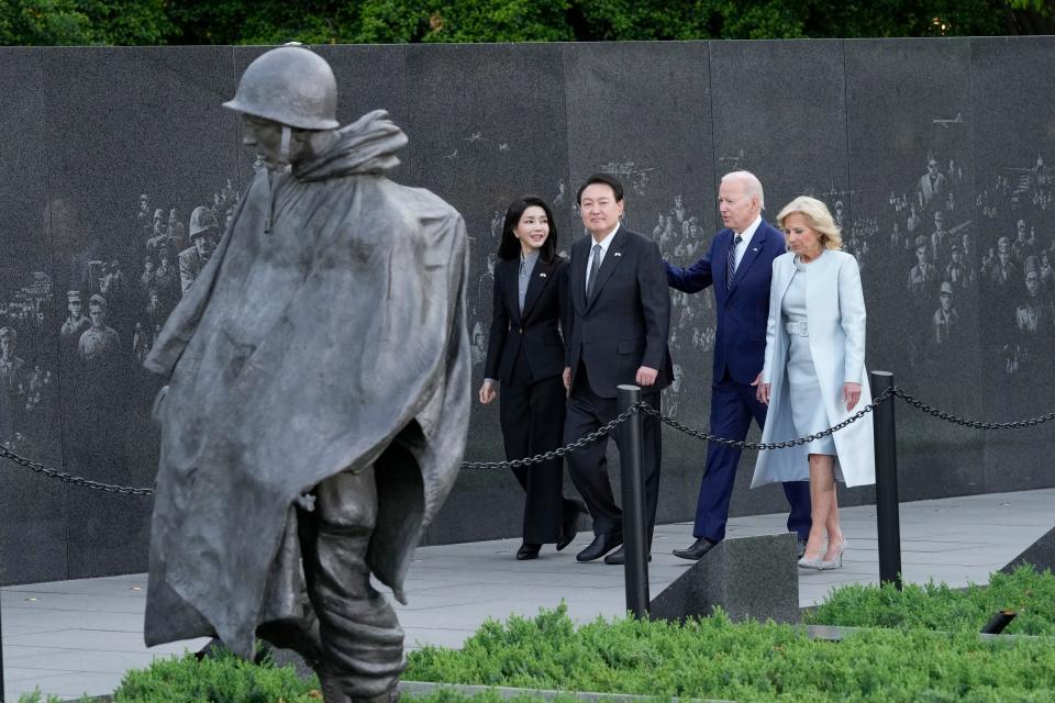 President Joe Biden, first lady Jill Biden, South Korea's President Yoon Suk Yeol and his wife Kim Keon Hee visit the Korean War Veterans Memorial in Washington, Tuesday, April 25, 2023.