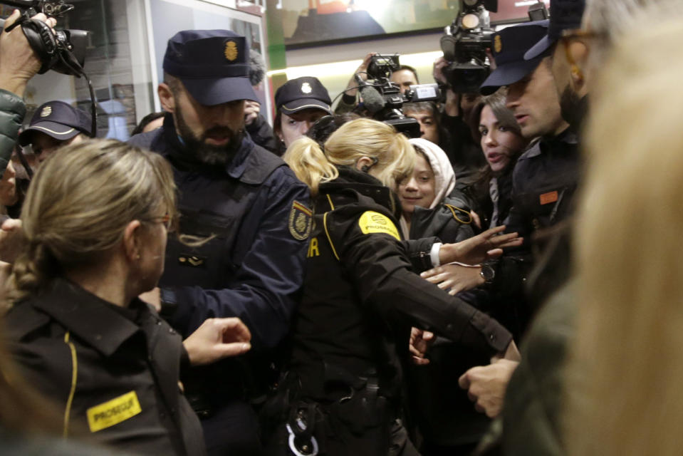 Climate activist Greta Thunberg arrives by train in Madrid on Friday Dec. 6, 2019. Thunberg arrived by catamaran in Lisbon after a three-week voyage across the Atlantic Ocean from the United States before heading to neighboring Spain to attend the U.N. Climate Change Conference taking place in Madrid. (AP Photo/Andrea Comas)