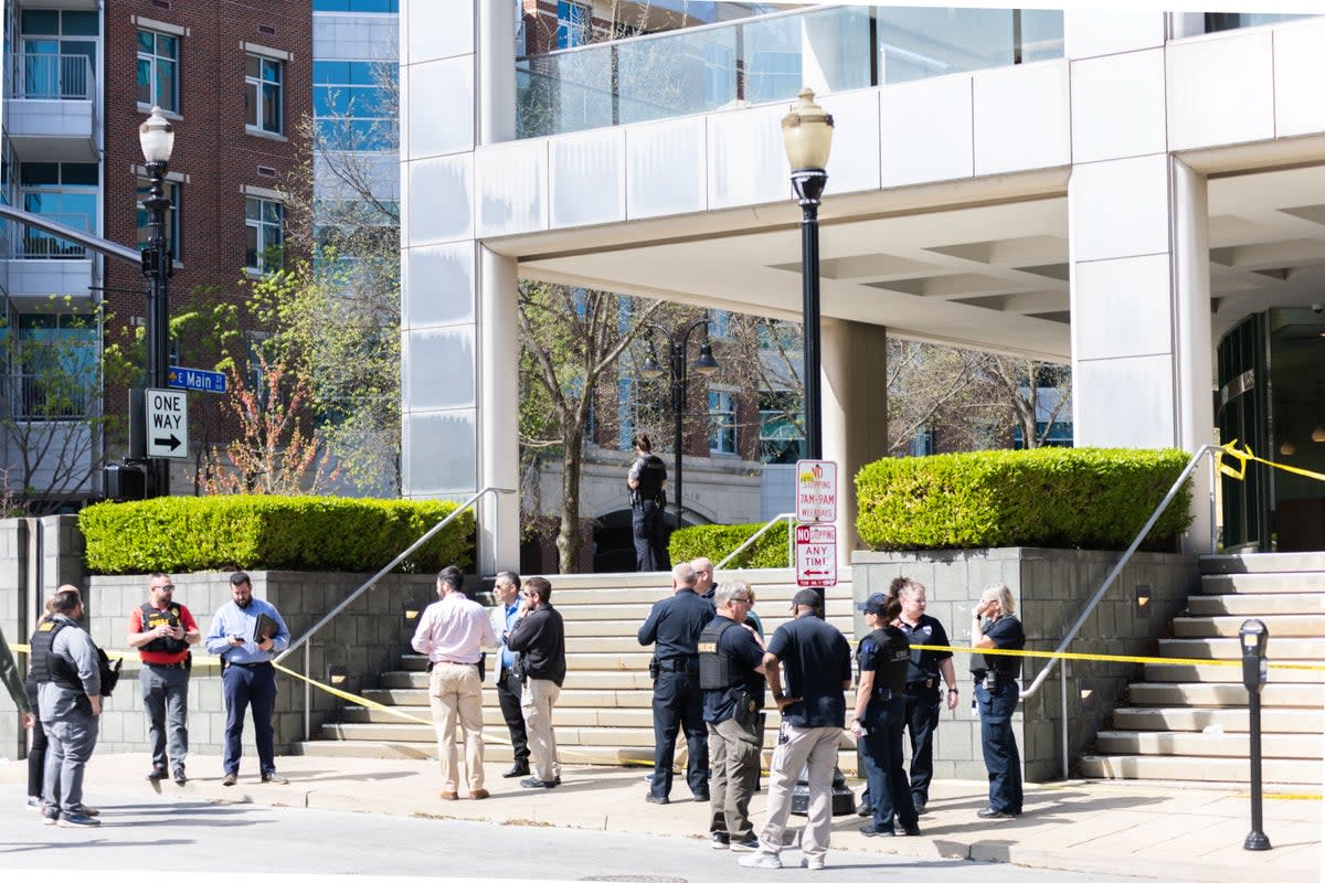 Police outside the bank where the shooting unfolded on Monday (AFP via Getty Images)