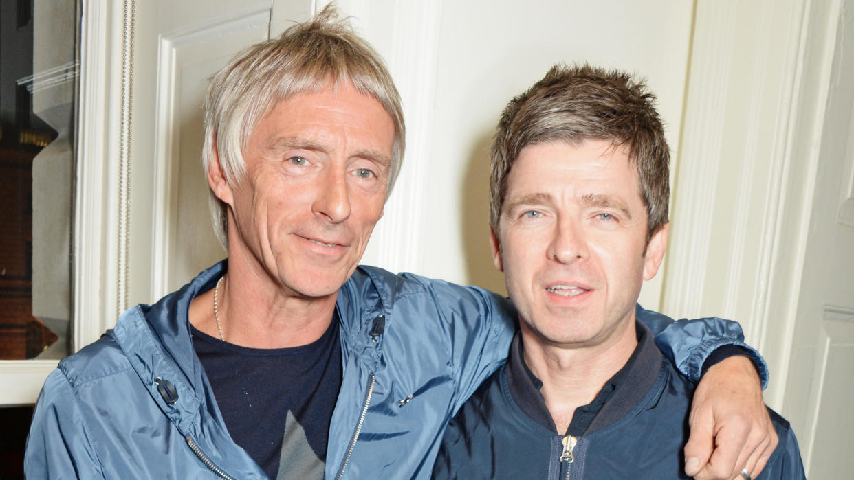   Paul Weller (L) and Noel Gallagher attend the launch of "Real Stars Are Rare", the new menswear line from Paul Weller, at Somerset House on October 8, 2014 in London. 