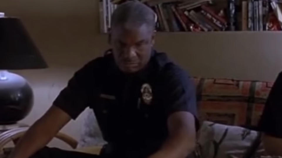 Richard Gant as a cop, looking annoyed and angry in The Big Lebowski