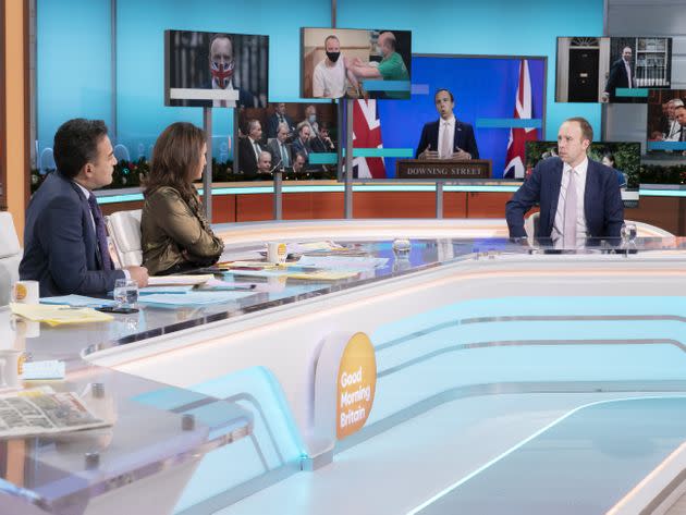 Adil Ray, Susanna Reid and Matt Hancock in the GMB studio (Photo: Ken McKay/ITV/Shutterstock)