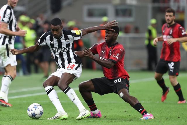 Paris Saint-Germain advances in tense finish to Champions League group.  Porto also into round of 16