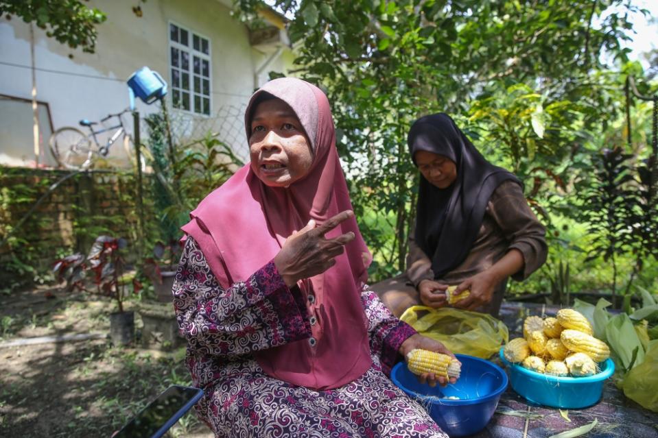 Fairuz Abdullah 57 speaks to Malay Mail during an interview at Kampung Hujung Bandar in Sik, Kedah, August 7, 2023. — Picture by Yusof Mat Isa