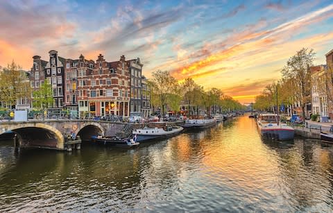 Amsterdam sunset city skyline - Credit: iStock