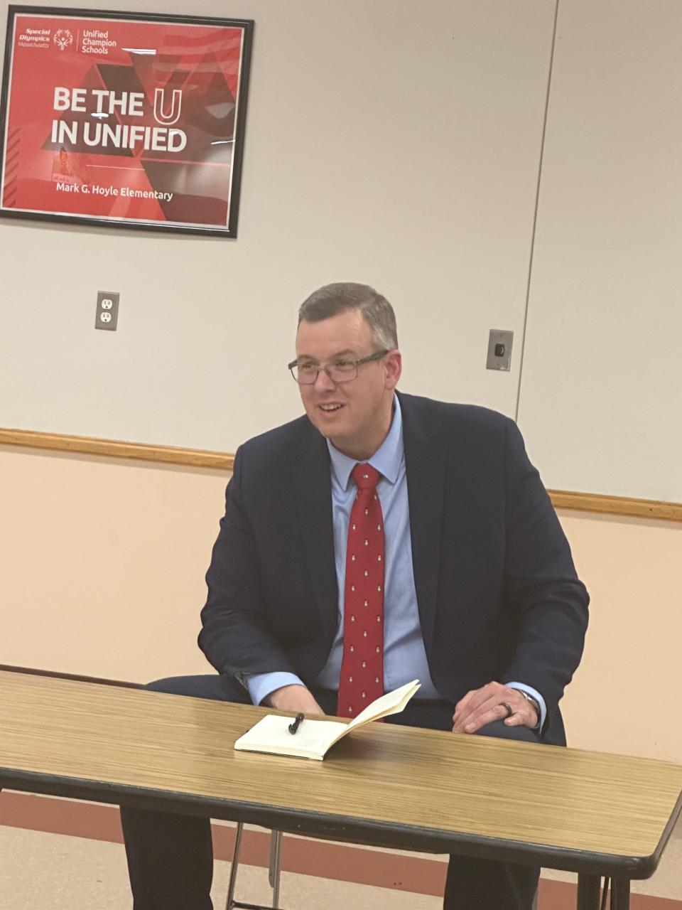 Taunton High School Principal Scott Holcomb speaks with members of the public during a forum to meet Swansea superintendent candidates on Monday, Feb. 12, 2024.