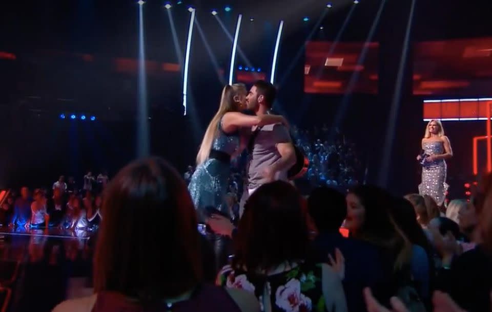 They also shared a cheeky kiss on the cheek. Source: The Voice AU / Channel Nine