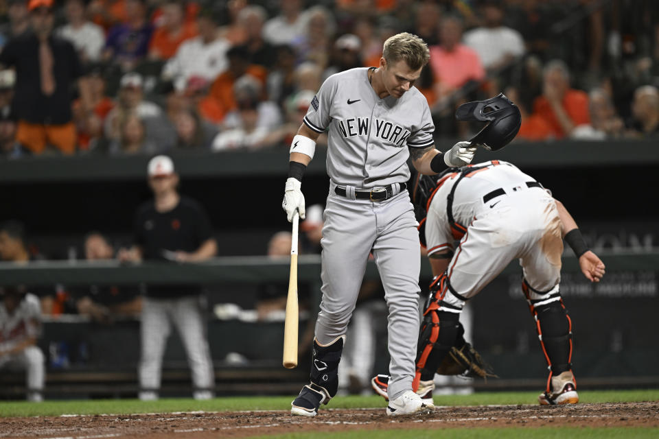 New York Yankees' Jake Bauers reacts after striking out with a runner on against the Baltimore Orioles in the eighth inning of a baseball game Sunday, July 30, 2023, in Baltimore. The Orioles won 9-3.(AP Photo/Gail Burton)