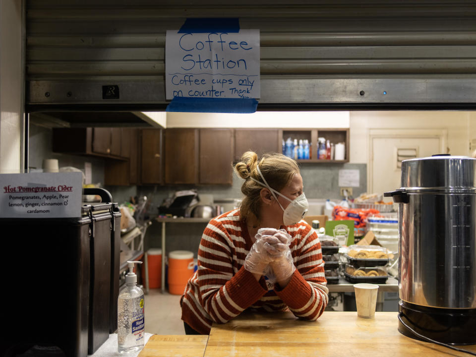 Paula Levitt volunteers at a drink station at the East Avenue Church shelter. (Photo: Cayce Clifford for HuffPost)