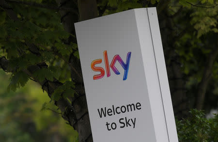 FILE PHOTO: The Sky logo is seen on outside of an entrance to offices and studios in west London, Britain June 29, 2017. REUTERS/Toby Melville/File Photo