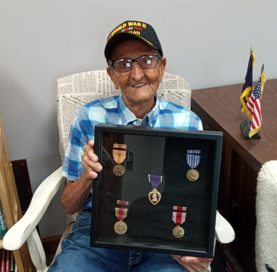 Tony Battaglia, 100, displays his medals from World War II. The Honesdale resident was an Army medic in the Aleutian Campaign.