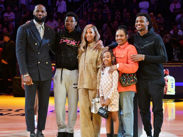 Allen Berezovsky/Getty LeBron James (left), Bryce James, Savannah James, Zhuri James, Gloria Marie James, and Bronny James