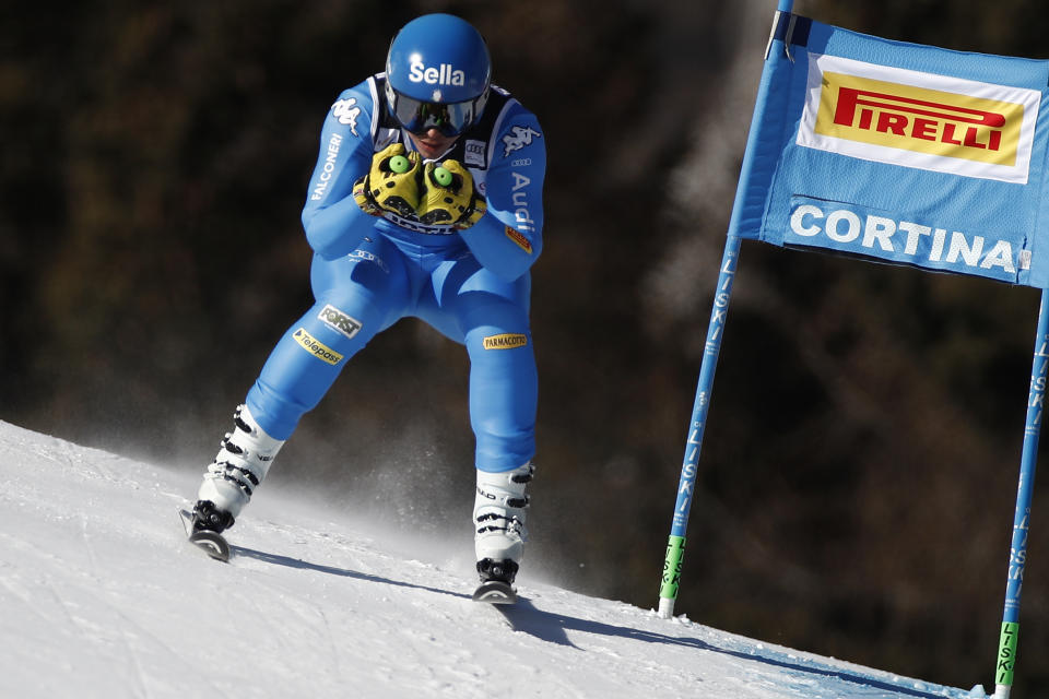 Italy's Elena Curtoni speeds down the course of an alpine ski, women's World Cup super-G race in Cortina d'Ampezzo, Italy, Sunday, Jan. 23, 2022. (AP Photo/Gabriele Facciotti)