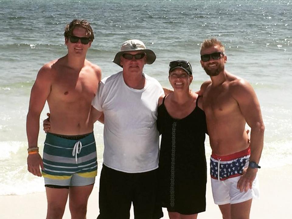 Joe Burrow with his parents