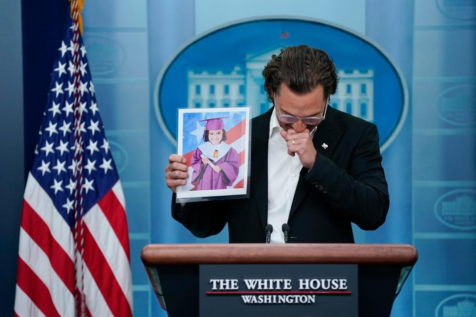 Actor Matthew McConaughey holds an image of Alithia Ramirez, 10, who was killed in the mass shooting at an elementary school in Uvalde, Texas, as he speaks during a news briefing at the White House on June 7 in Washington.