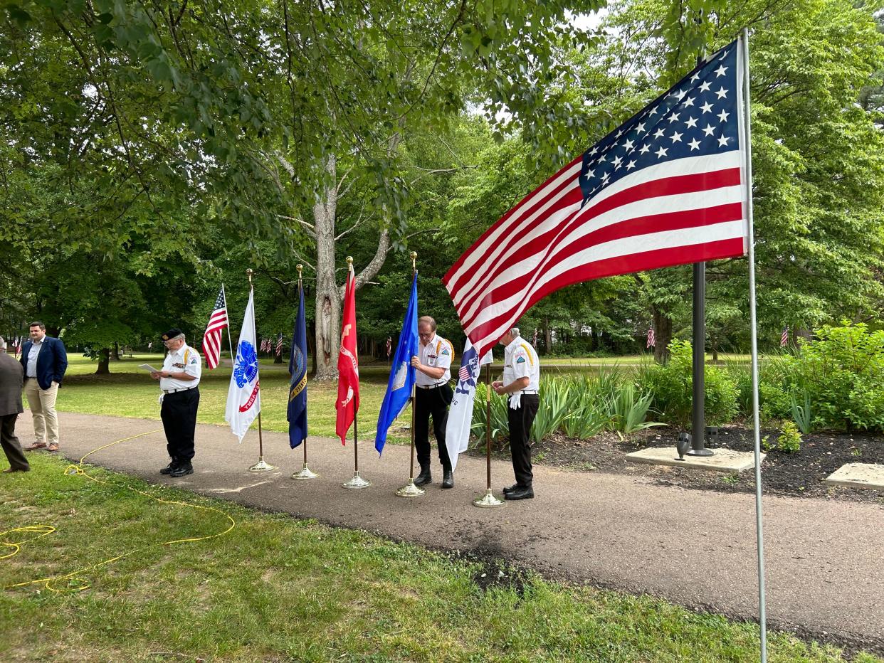 Veterans prepare flag display for Flag Day ceremony at Liberty Garden Arboretum and Park in Jackson, Tenn., on June 14, 2023.