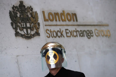 A man takes part in a demonstration at the London stock exchange during an Extinction Rebellion protest in London, Britain April 25, 2019. REUTERS/Simon Dawson