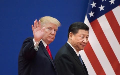 Trump Xi - Credit: &nbsp;NICOLAS ASFOURI/AFP