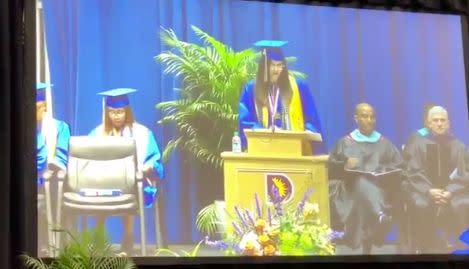 A valedictorian's speech is cut short as principal signals for microphone to be turned off (Credit: Twitter)